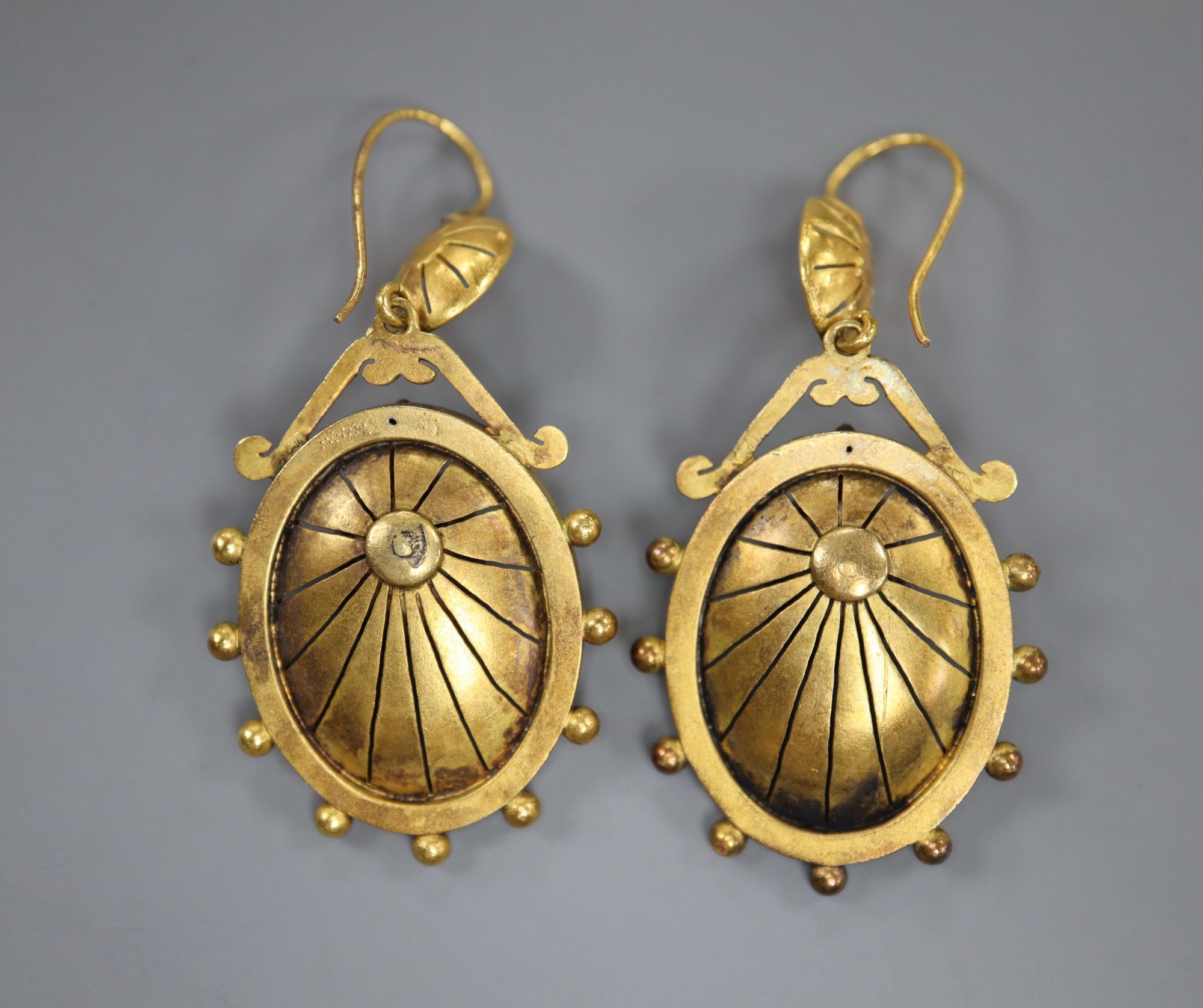 A pair of Victorian Etruscan revival yellow metal oval drop earrings, 43mm, 8.2 grams.